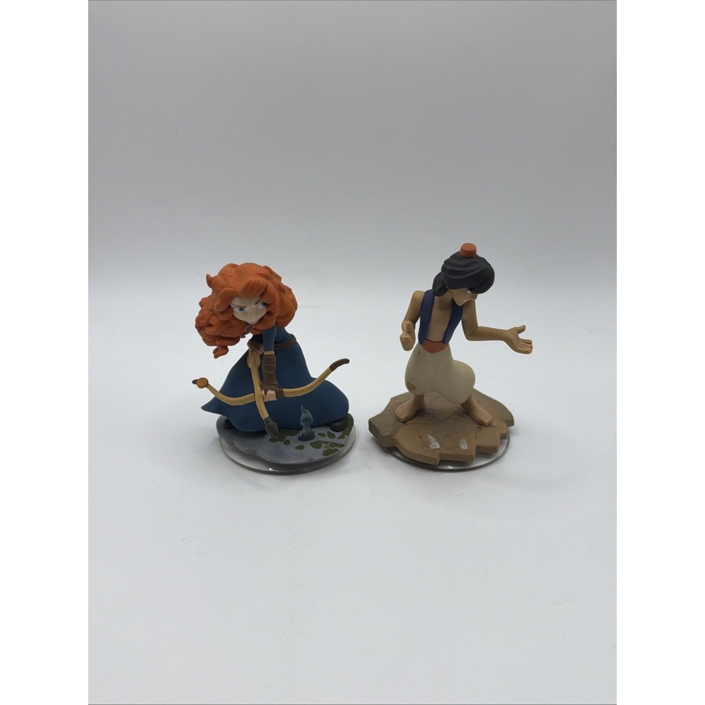 Lot of 2 Disney Infinity Figures - Aladdin and Merida Brave